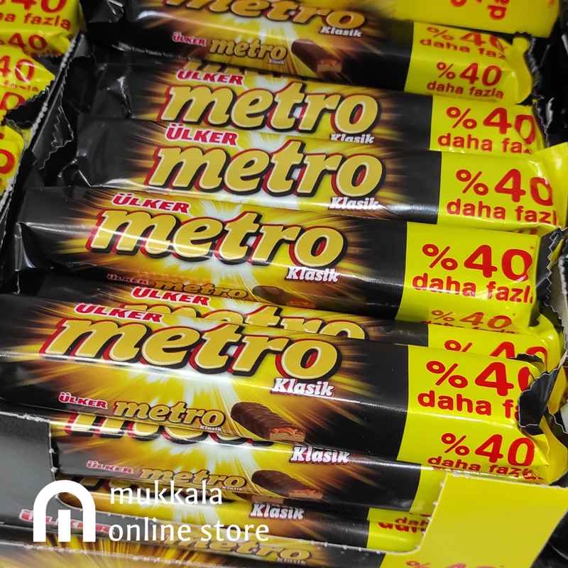 شکلات مترو دوبل اولکر با مغز بادام و کارامل و روکش کاکائو %40 - 50.4 گرم (بسته 18 عددی)